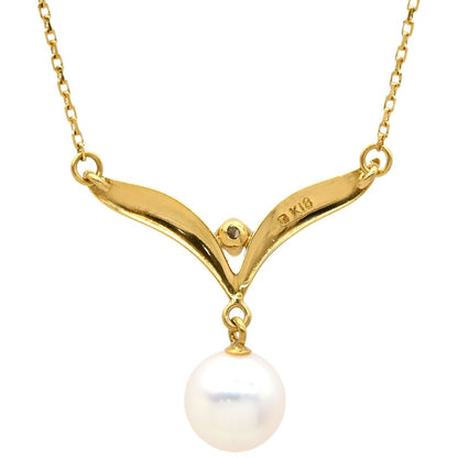 Mikimoto pearl necklace with pearl white and yellow gold, diamond V-shape design, 42 cm length