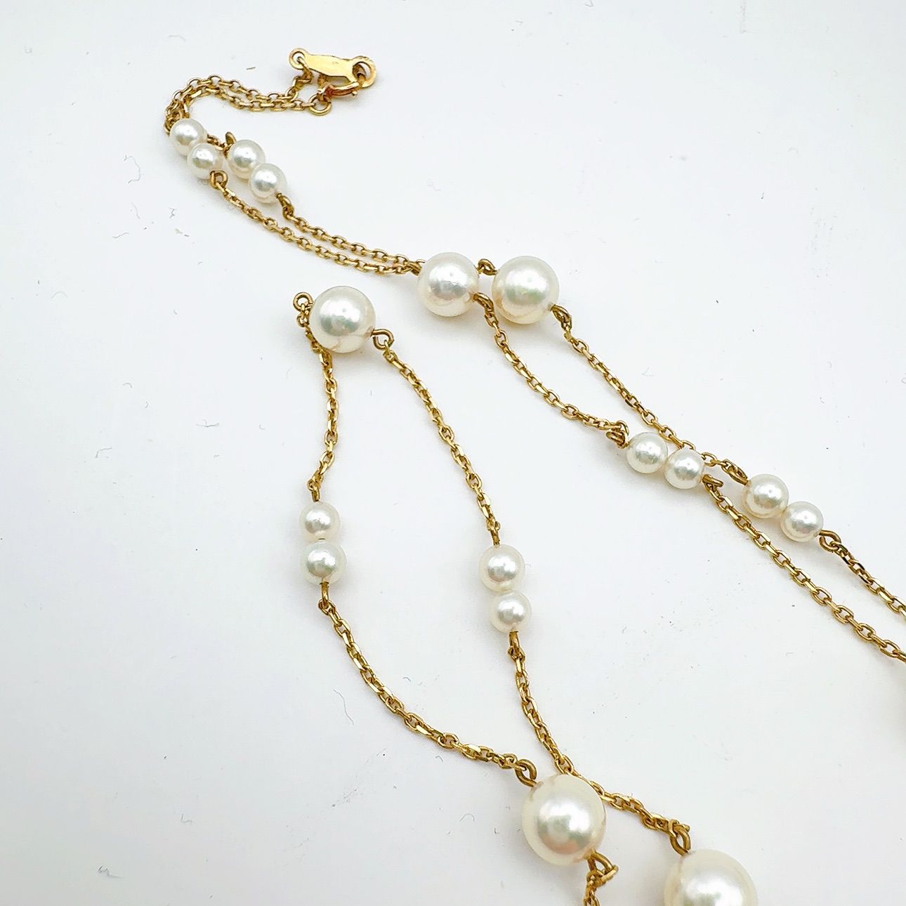Mikimoto station pearl necklace with 3.7-6.4mm pearls on a 67cm K14 chain weighing 7.4g