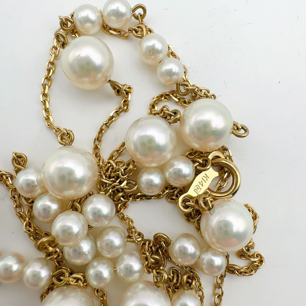 Mikimoto station pearl necklace with 3.7-6.4mm pearls on a 67cm K14 chain weighing 7.4g