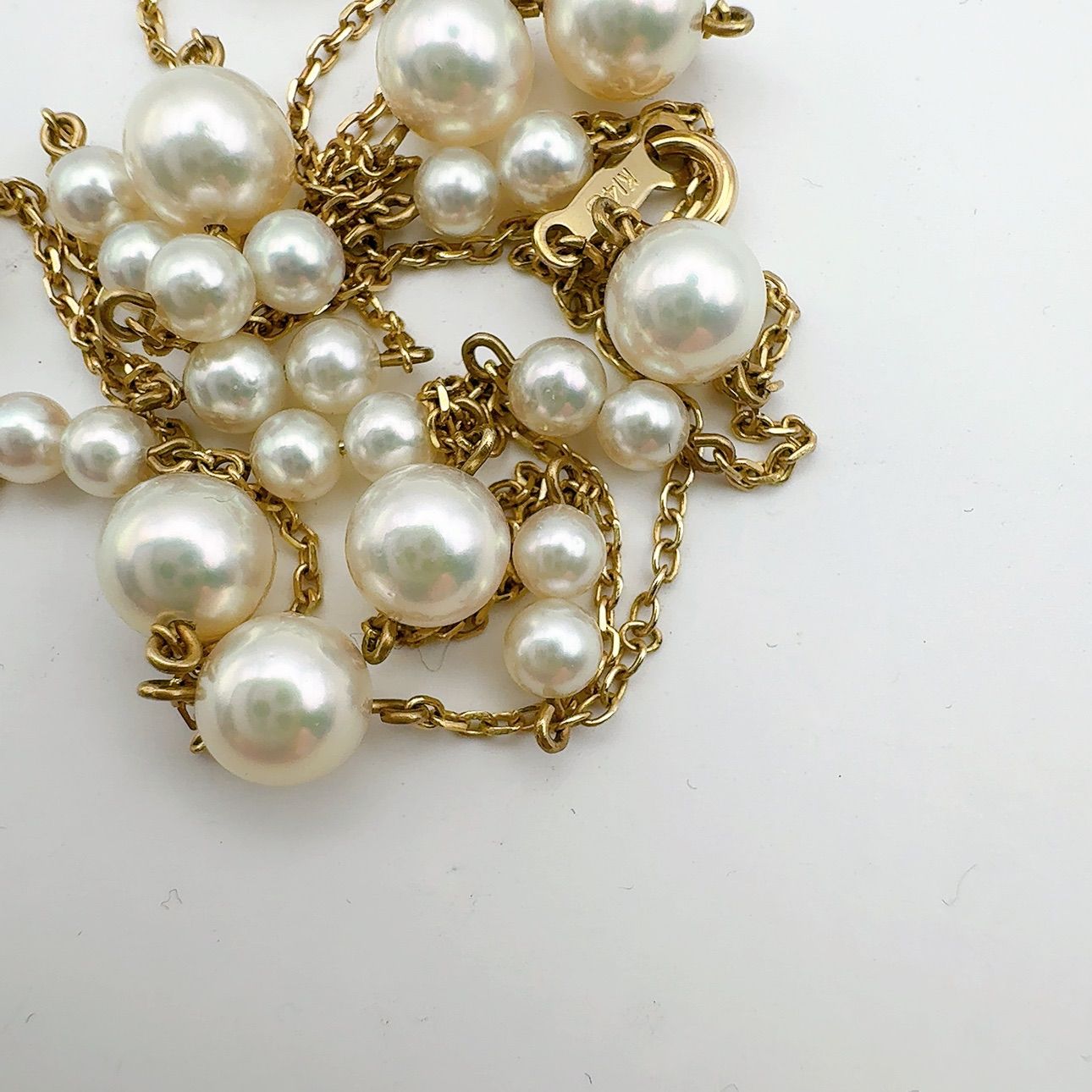Mikimoto station pearl necklace with 3.7-6.4mm pearls on a 67cm K14 chain weighing 7.4g