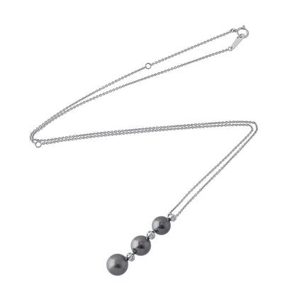 Mikimoto necklace with black South Sea pearls and diamonds set in 18K white gold, 55 cm length