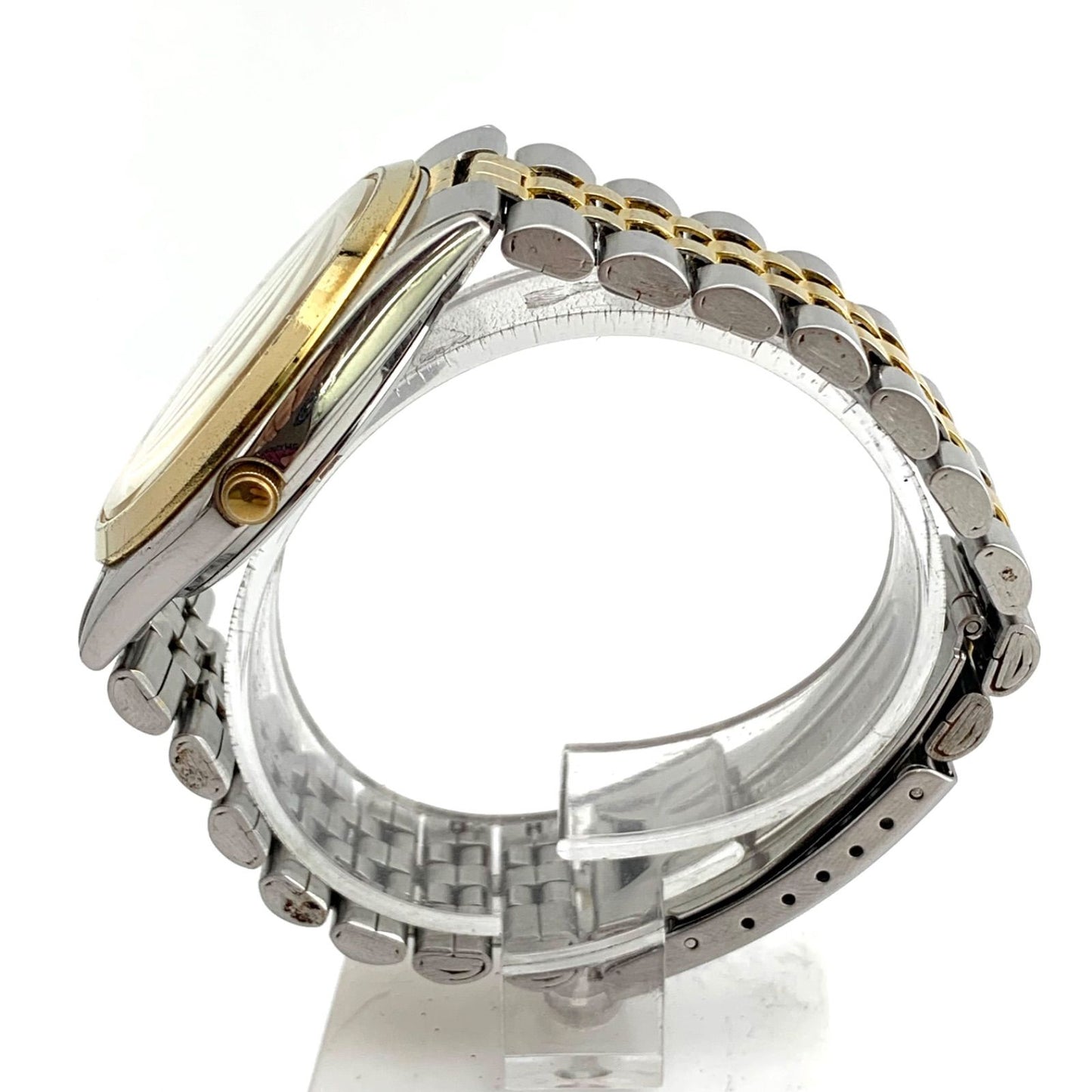 Used CITIZEN 6100 Quartz wristwatch in silver and gold with stainless steel band and date display