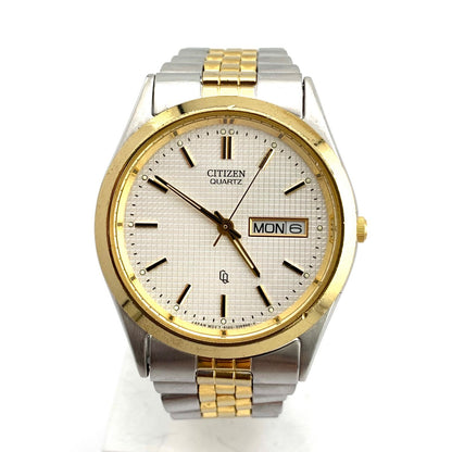 Used CITIZEN 6100 Quartz wristwatch in silver and gold with stainless steel band and date display