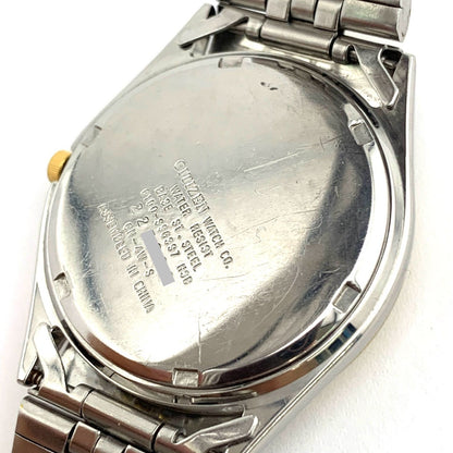 Used CITIZEN 6100 Quartz wristwatch in silver and gold with stainless steel band and date display