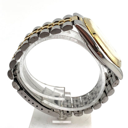 Used CITIZEN 6100 Quartz wristwatch in silver and gold with stainless steel band and date display