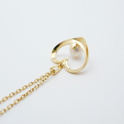 Mikimoto Heart Motif Akoya pearl pendant necklace with 6.2mm pearl in 18K yellow gold on a 40cm chain