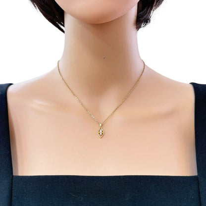 Mikimoto 18K yellow gold pendant top with one diamond, measuring 6.5mm by 18mm