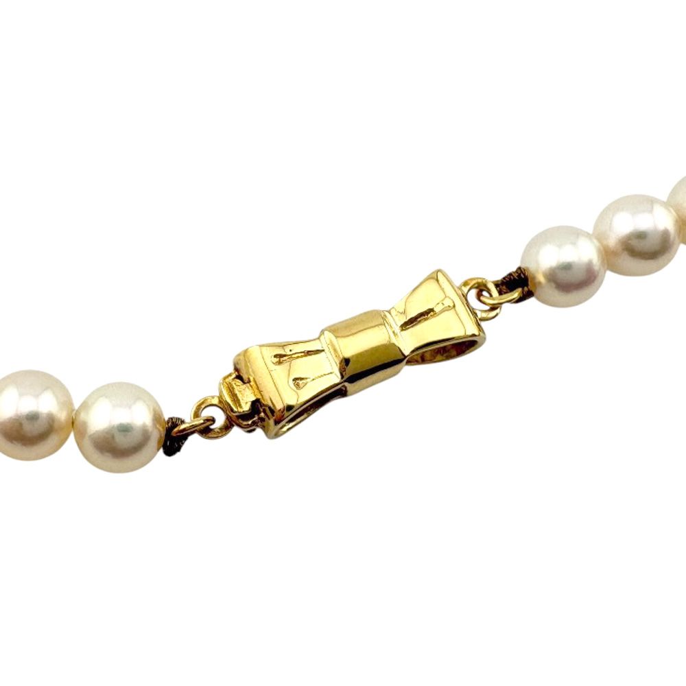 MIKIMOTO 18K yellow gold necklace featuring a single 5.2mm pearl on a 40cm chain for women