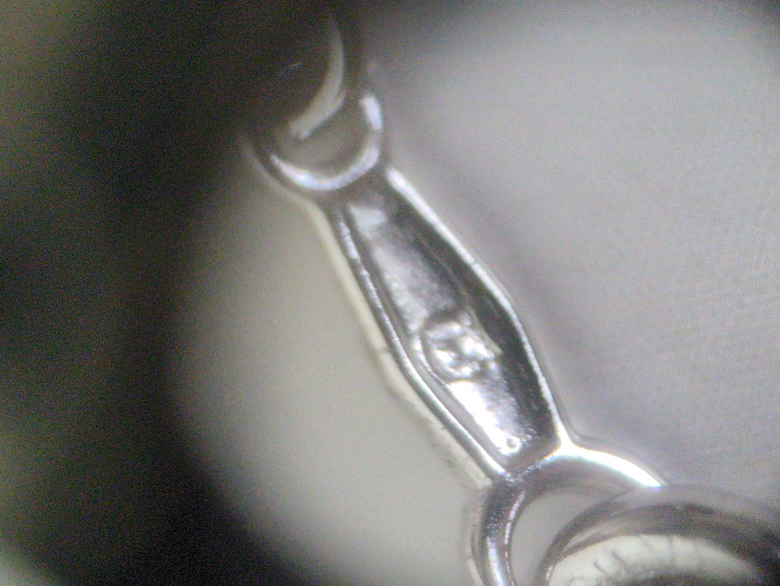 Close-up of a Mikimoto Pearl Necklace featuring lustrous genuine pearls on a delicate string