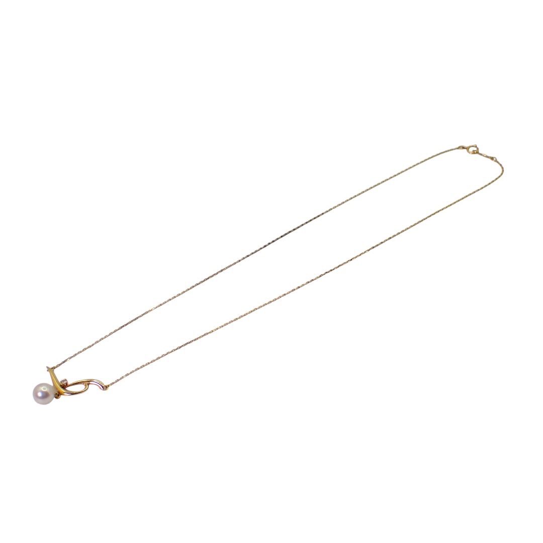 MIKIMOTO 7.2mm Akoya pearl necklace with diamond leaf pendant in 18K yellow gold on 42cm chain