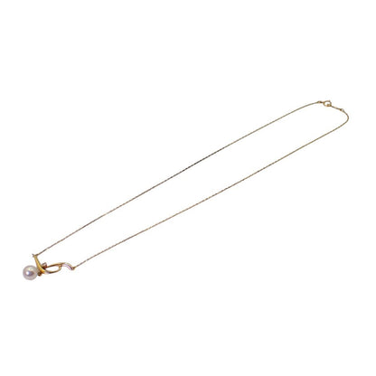 MIKIMOTO 7.2mm Akoya pearl necklace with diamond leaf pendant in 18K yellow gold on 42cm chain