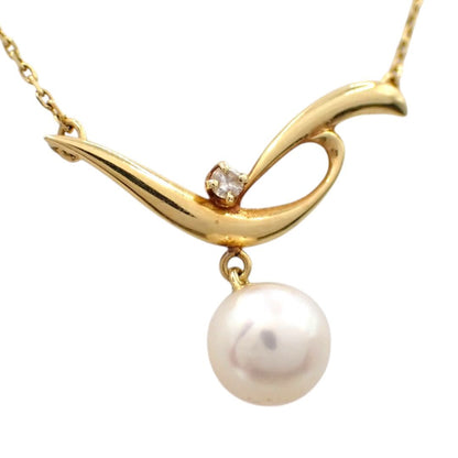MIKIMOTO 7.2mm Akoya pearl necklace with diamond leaf pendant in 18K yellow gold on 42cm chain