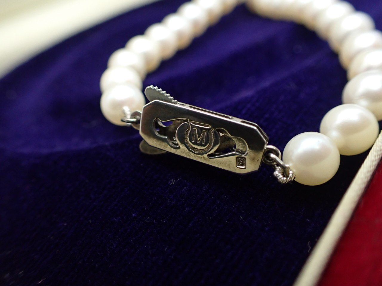 Mikimoto Akoya pearl necklace with 6mm round pearls and a silver clasp measuring 42cm in length