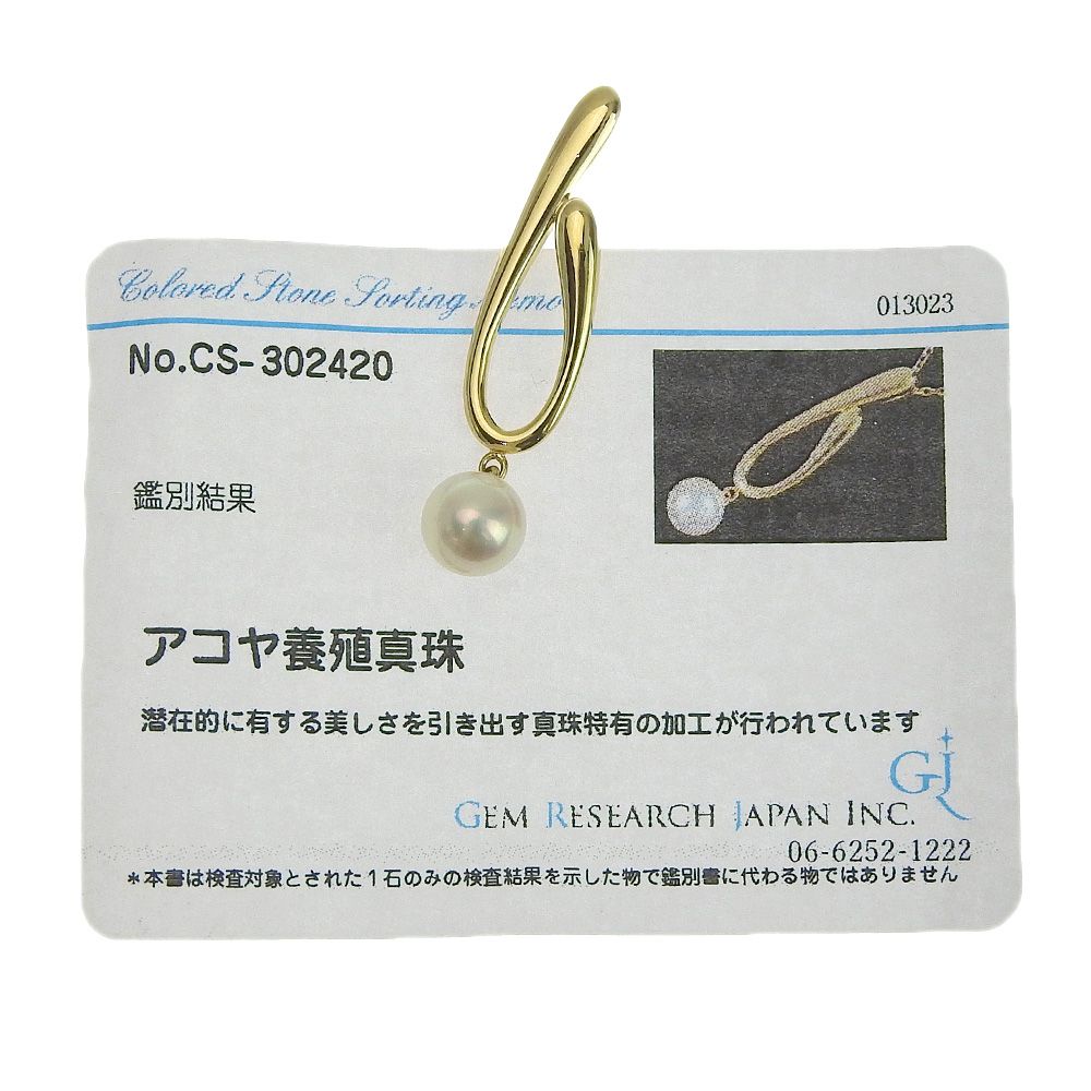 Mikimoto pendant top with white 7mm Akoya cultured pearl set in 14K yellow gold, measuring 0.8cm by 3.5cm