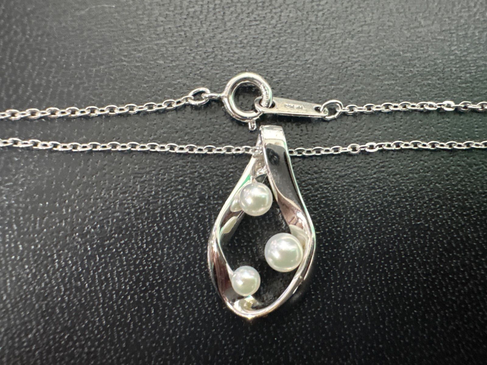 Mikimoto silver pearl necklace with 39.5cm length and sterling silver stamp shown on white background