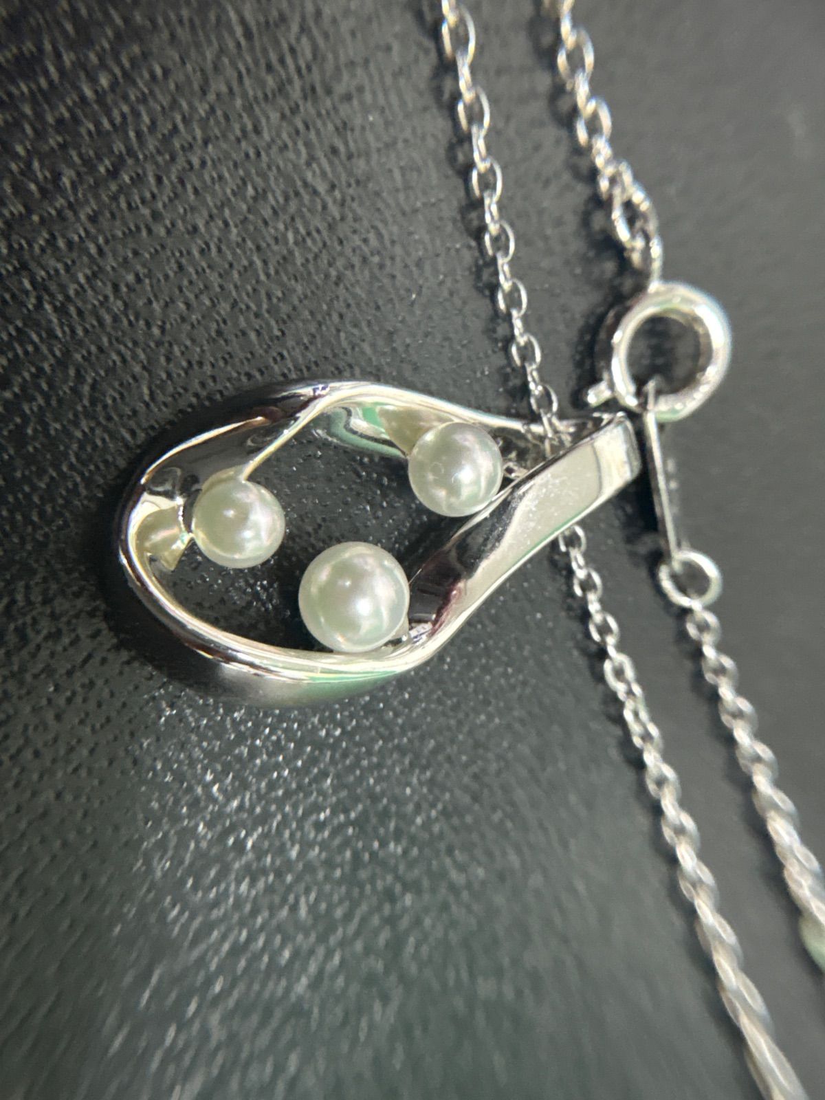 Mikimoto silver pearl necklace with 39.5cm length and sterling silver stamp shown on white background