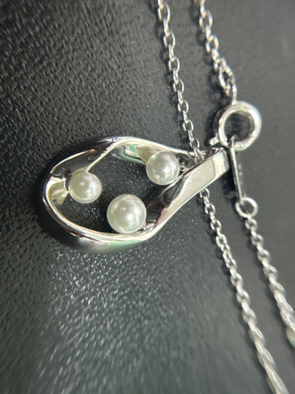 Mikimoto silver pearl necklace with 39.5cm length and sterling silver stamp shown on white background