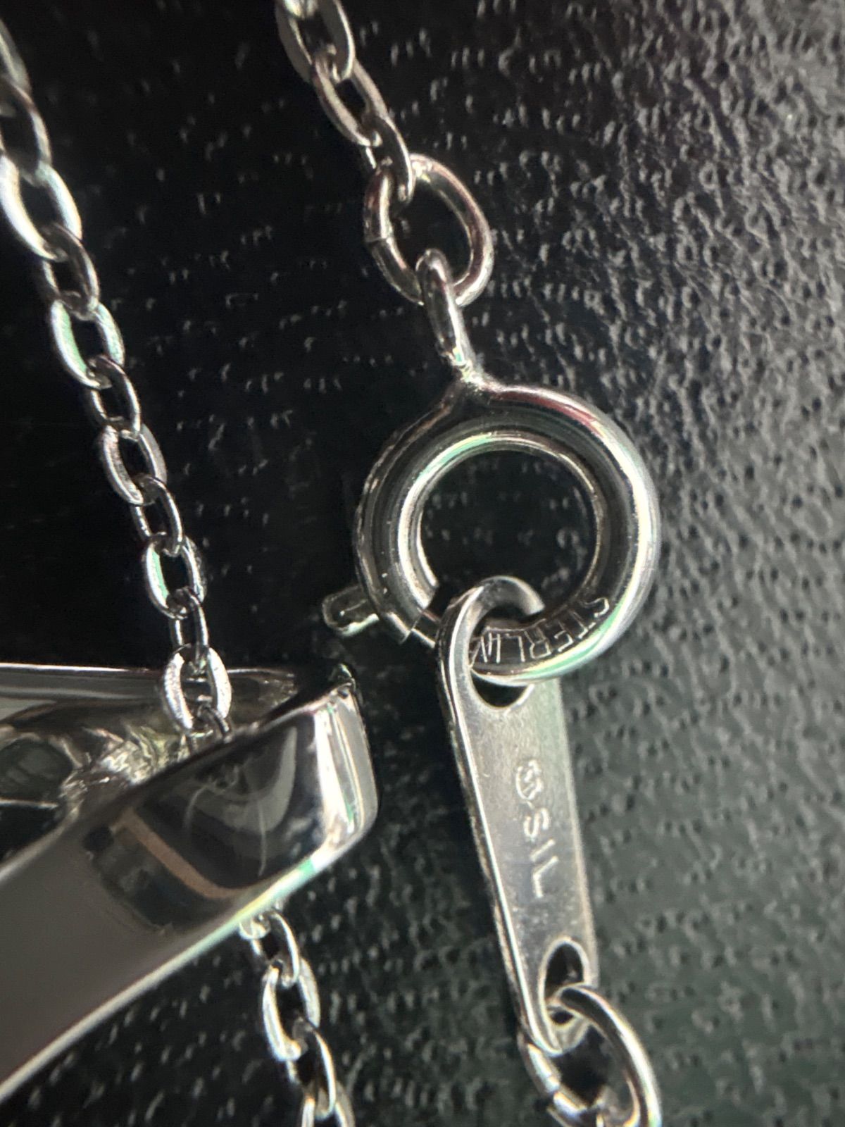 Mikimoto silver pearl necklace with 39.5cm length and sterling silver stamp shown on white background