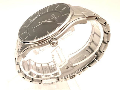 Citizen Eco-Drive men's watch with black dial and stainless steel bracelet model E031-S103720