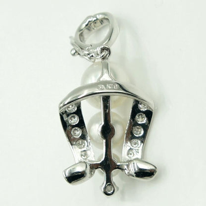 Mikimoto K18 gold pendant top with pearl and diamond detailing measuring 21.5mm by 13.7mm