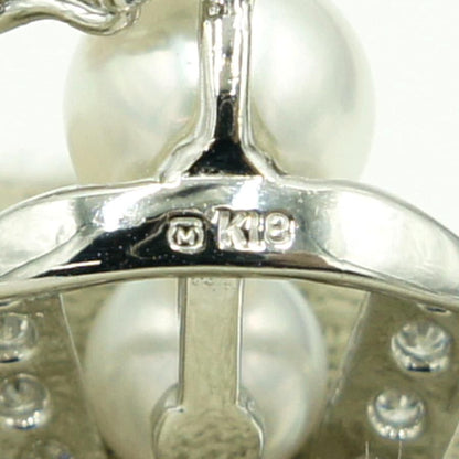 Mikimoto K18 gold pendant top with pearl and diamond detailing measuring 21.5mm by 13.7mm