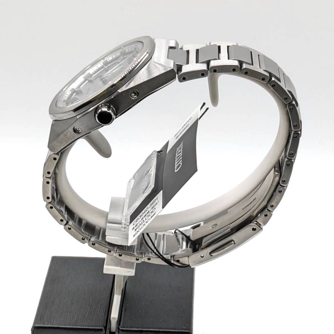 Citizen Attesa CB3040-56H men's watch with silver case and black dial shown on a wrist
