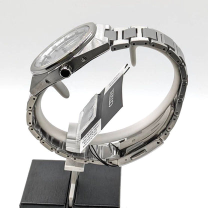 Citizen Attesa CB3040-56H men's watch with silver case and black dial shown on a wrist