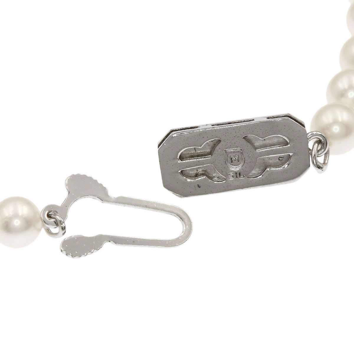 Mikimoto Pearl Necklace with 5.5-5.7 mm pearls and 36 cm silver chain displayed on white background