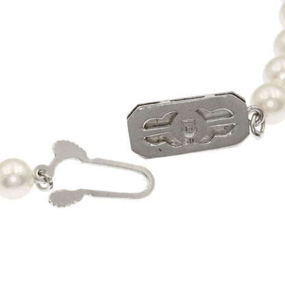 Mikimoto Pearl Necklace with 5.5-5.7 mm pearls and 36 cm silver chain displayed on white background