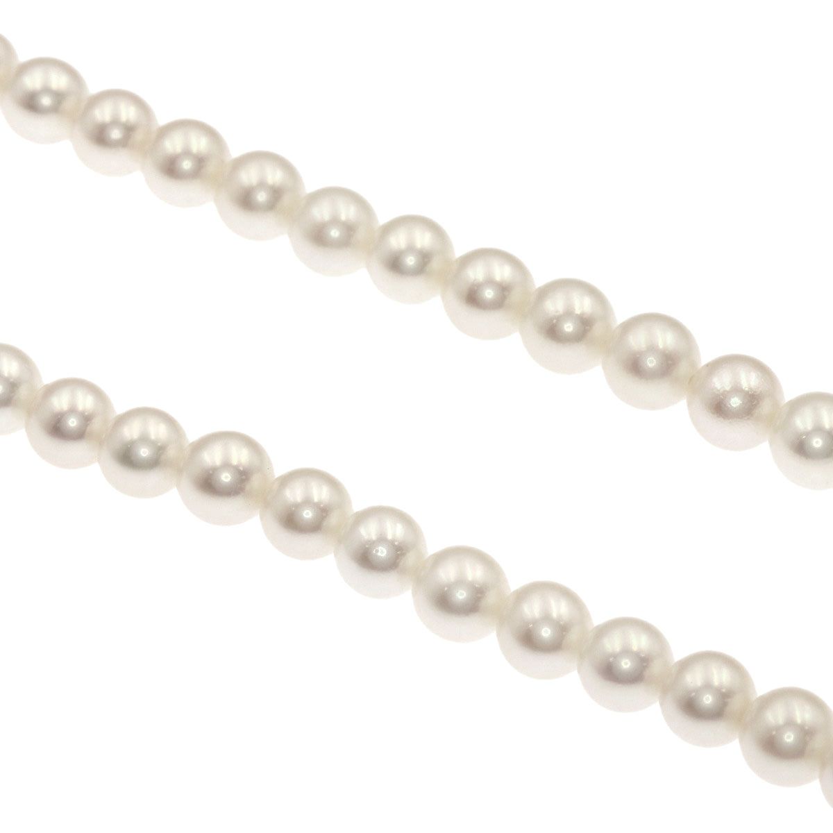 Mikimoto Pearl Necklace with 5.5-5.7 mm pearls and 36 cm silver chain displayed on white background