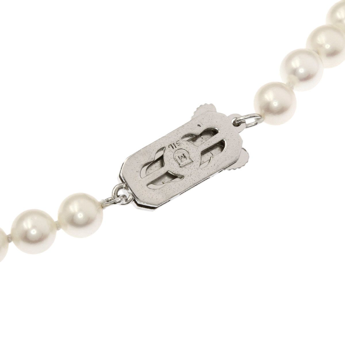 Mikimoto Pearl Necklace with 5.5-5.7 mm pearls and 36 cm silver chain displayed on white background
