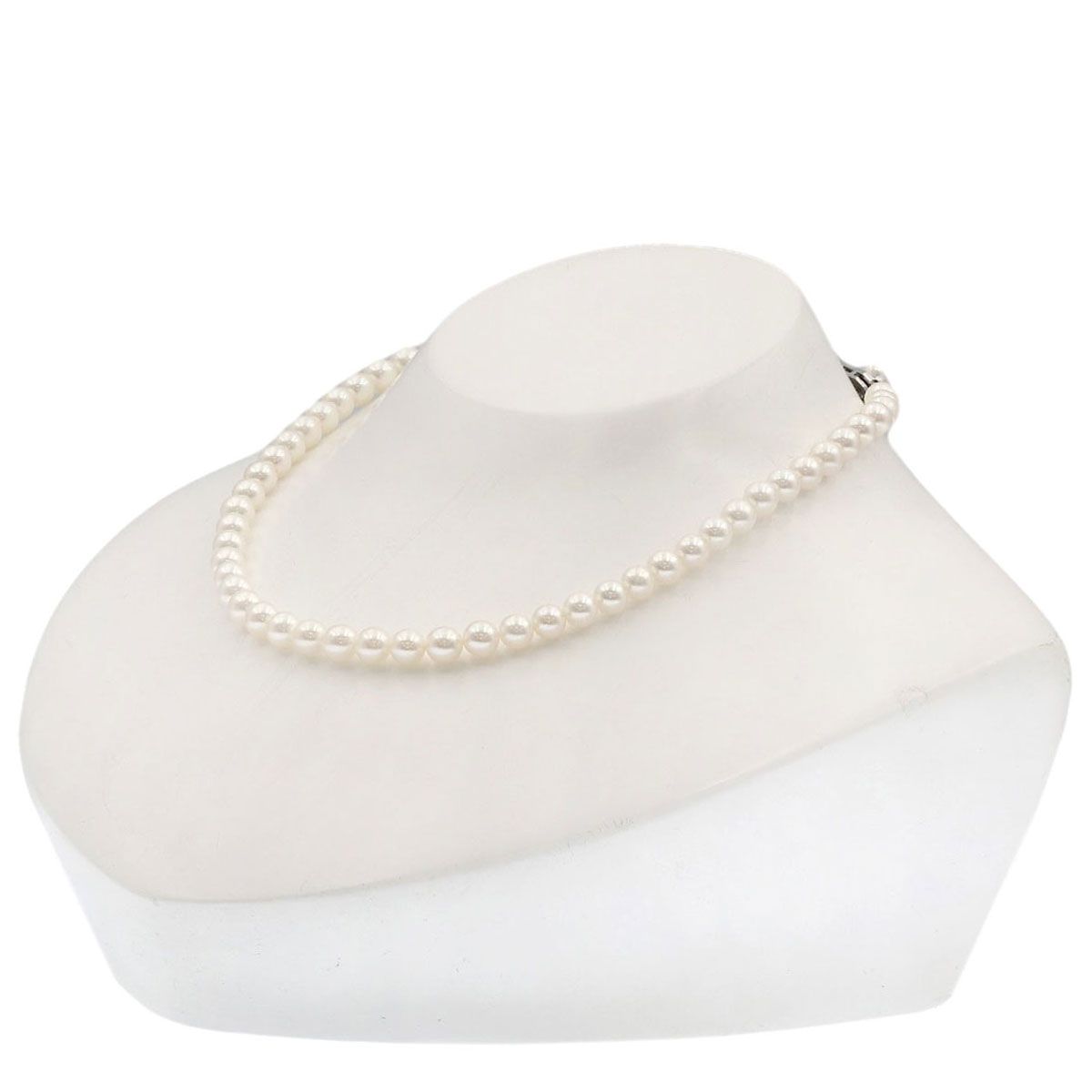 Mikimoto Pearl Necklace with 5.5-5.7 mm pearls and 36 cm silver chain displayed on white background