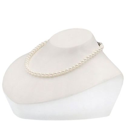 Mikimoto Pearl Necklace with 5.5-5.7 mm pearls and 36 cm silver chain displayed on white background