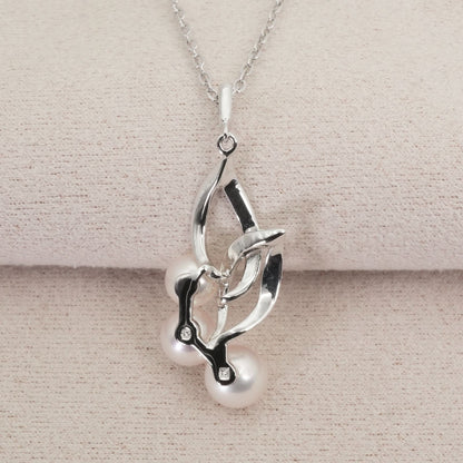 Mikimoto baby pearl silver necklace model 26-0306 with delicate silver chain and lustrous pearl pendant