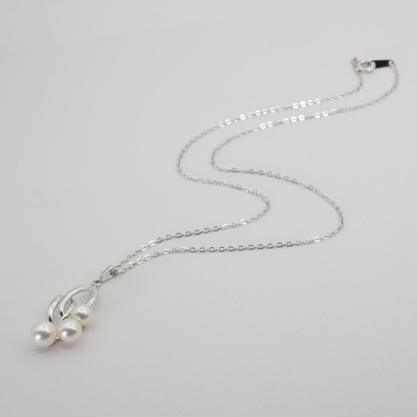 Mikimoto baby pearl silver necklace model 26-0306 with delicate silver chain and lustrous pearl pendant