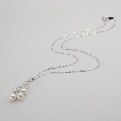 Mikimoto baby pearl silver necklace model 26-0306 with delicate silver chain and lustrous pearl pendant