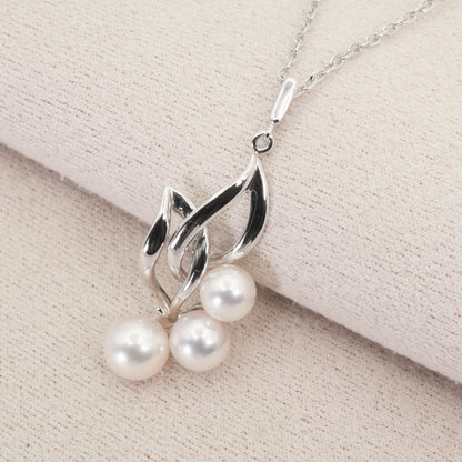 Mikimoto baby pearl silver necklace model 26-0306 with delicate silver chain and lustrous pearl pendant