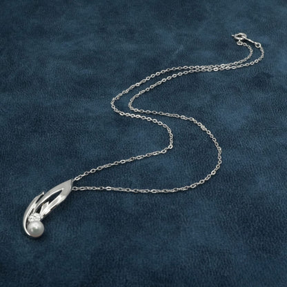 Mikimoto silver necklace featuring a single Akoya pearl pendant, model 26-0123 in excellent used condition