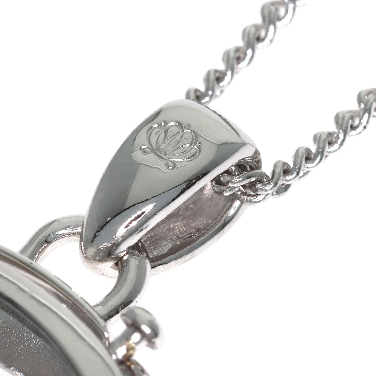 MIKIMOTO pearl necklace with metal chain and attached loupe, detailed close-up view