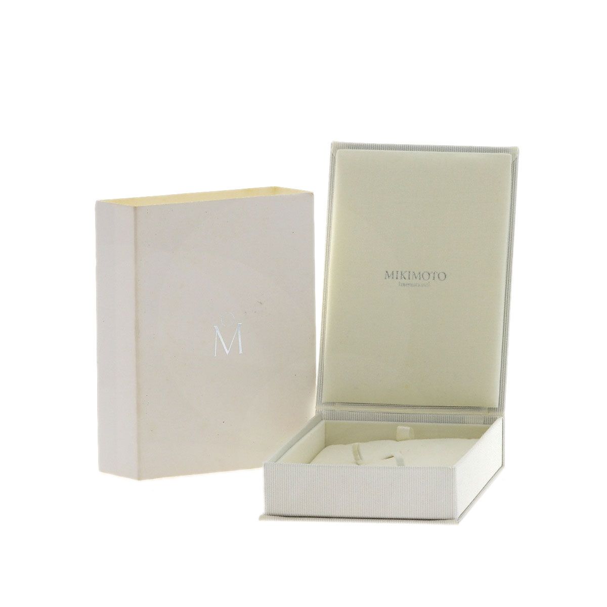 MIKIMOTO pearl necklace with metal chain and attached loupe, detailed close-up view