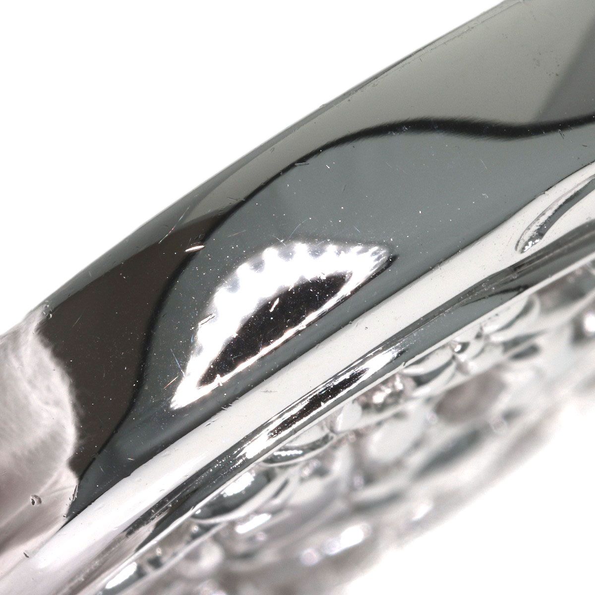 MIKIMOTO pearl necklace with metal chain and attached loupe, detailed close-up view