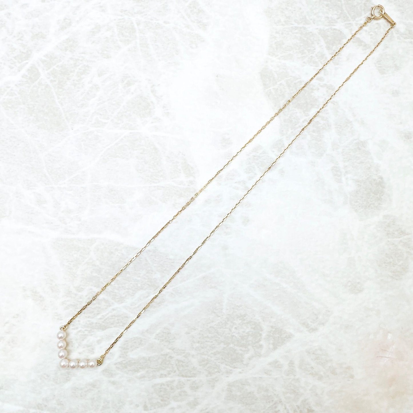 Law Baby Pearl Yellow Gold Necklace with 3.3mm pearls, 40cm length, and 19.5cm wide top detail