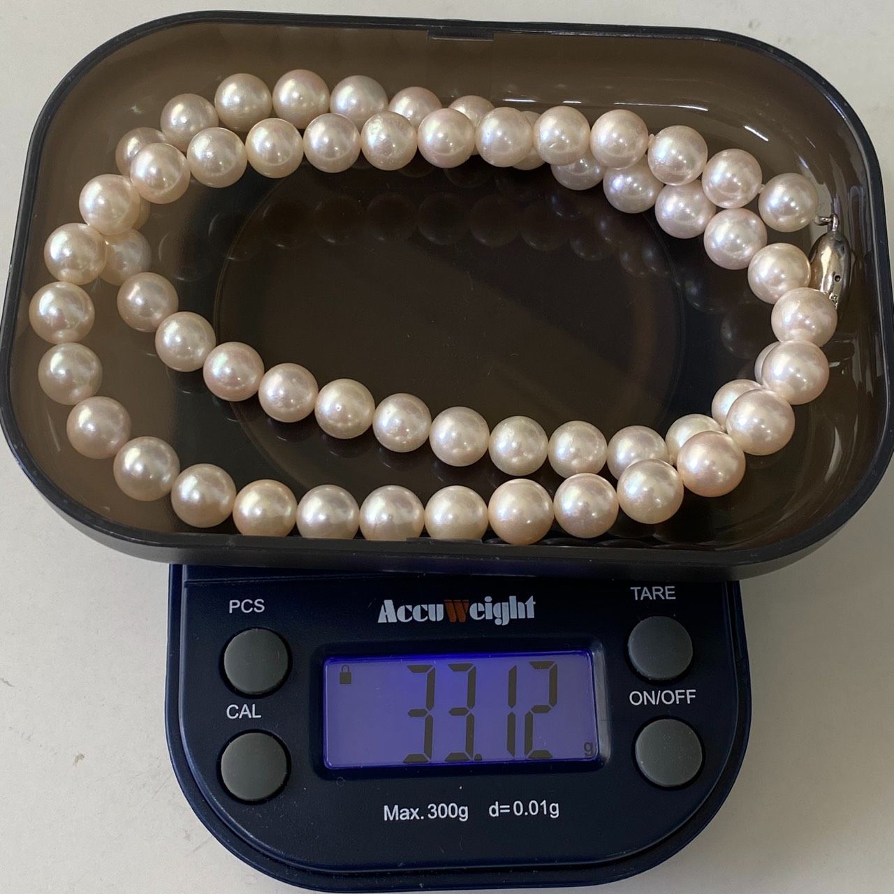 Akoya pearl necklace and earrings set with 7.0-7.32mm pearls on silver 925 and K14WG settings