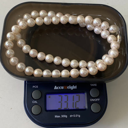 Akoya pearl necklace and earrings set with 7.0-7.32mm pearls on silver 925 and K14WG settings
