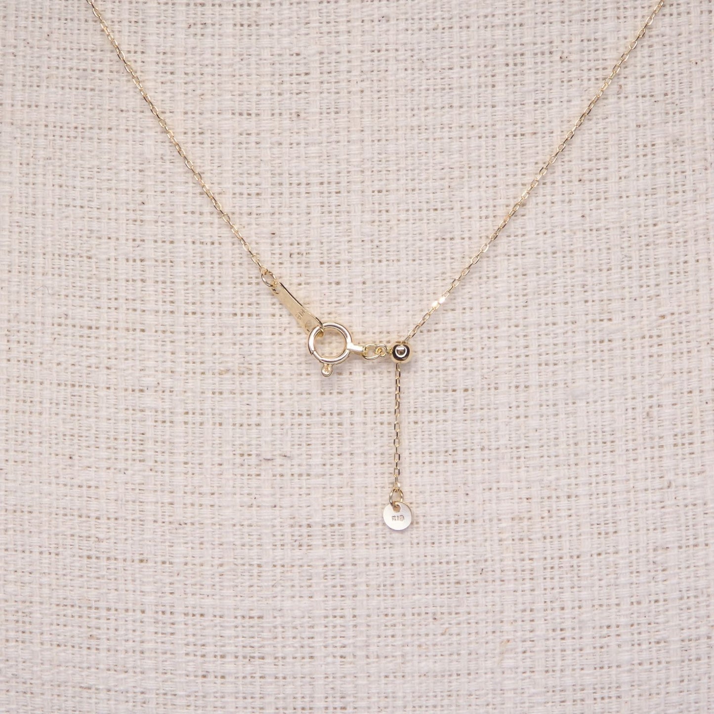 Pearl necklace with 8.2mm Akoya pearl and K18 gold chain featuring a triangle hat pendant