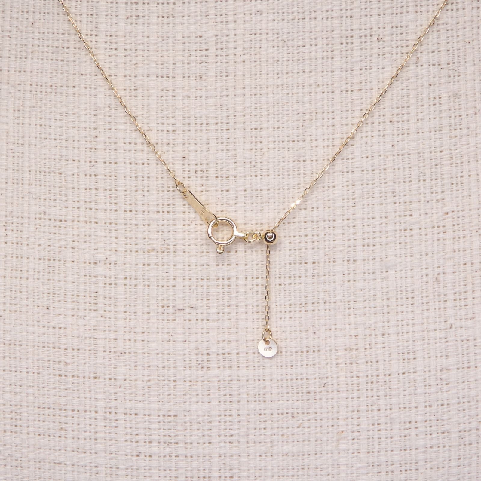 Pearl necklace with 8.2mm Akoya pearl and K18 gold chain featuring a triangle hat pendant