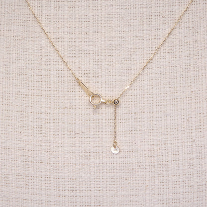 Pearl necklace with 8.2mm Akoya pearl and K18 gold chain featuring a triangle hat pendant