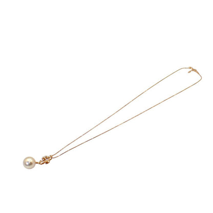 Tasaki 11mm white South Sea pearl necklace with diamond-accented K18 yellow gold cross pendant on a 44 cm chain