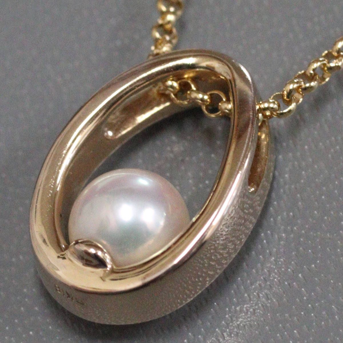 Mikimoto K18 yellow gold pearl pendant with 42cm chain, measuring 11mm by 16mm, weighing 7.1g