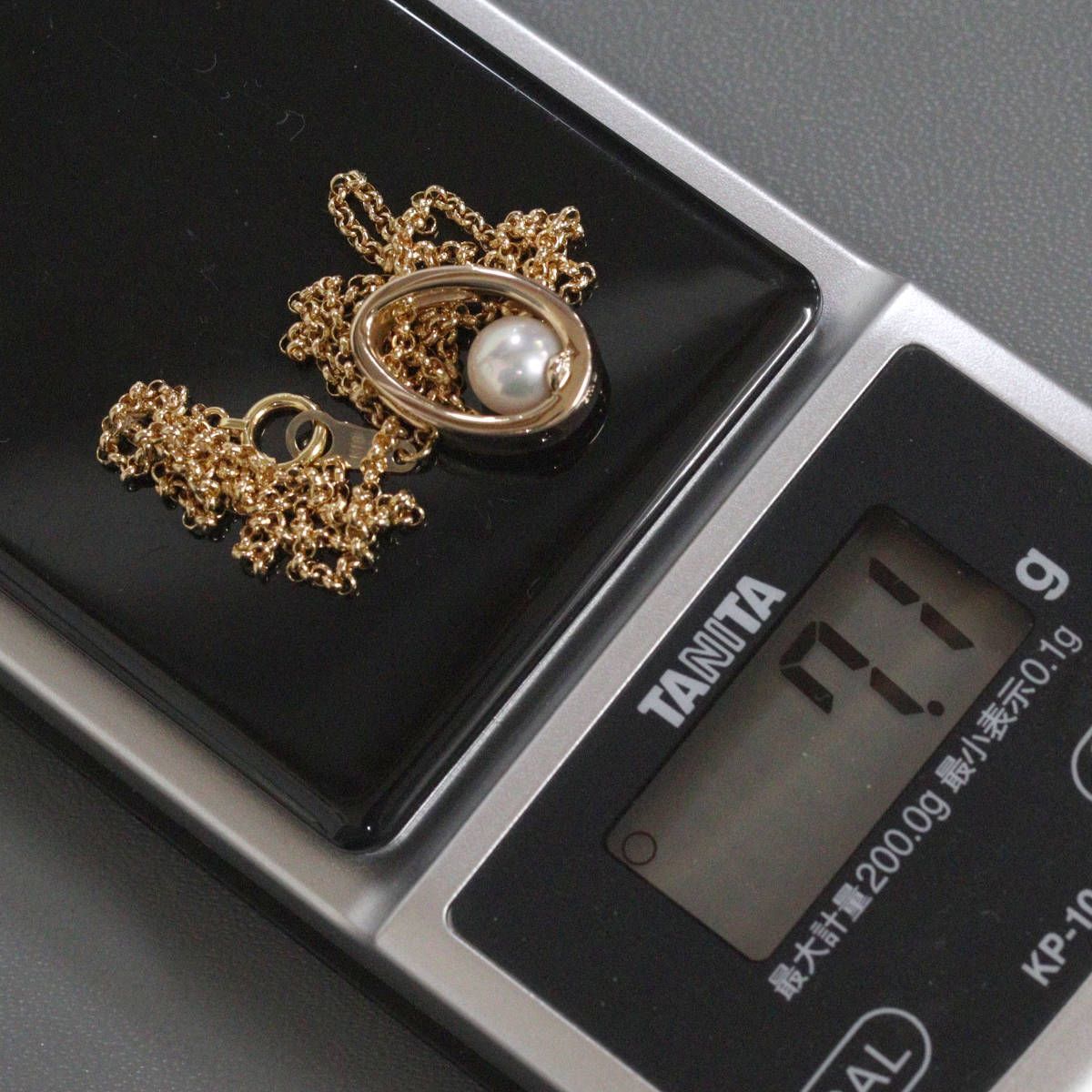 Mikimoto K18 yellow gold pearl pendant with 42cm chain, measuring 11mm by 16mm, weighing 7.1g